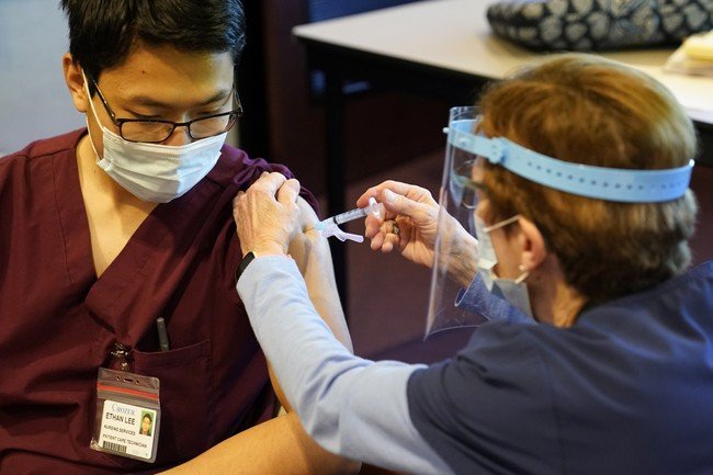 What is causing the slowdown in vaccinations?